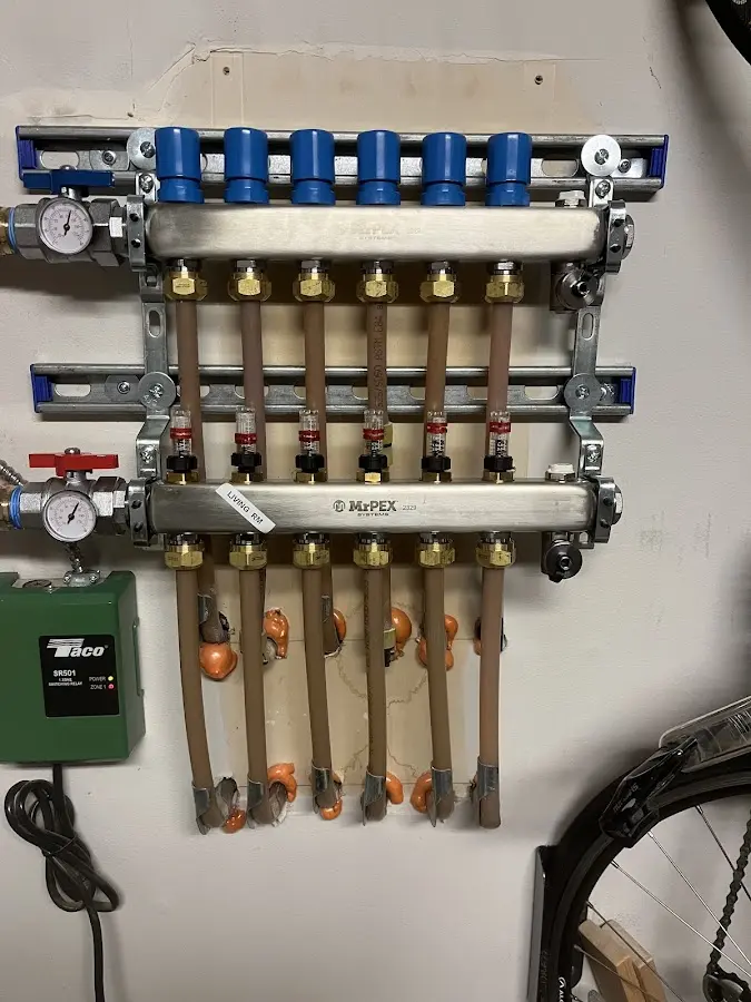 Plumber performing Water Heater Repair at a residential property in Chelsea